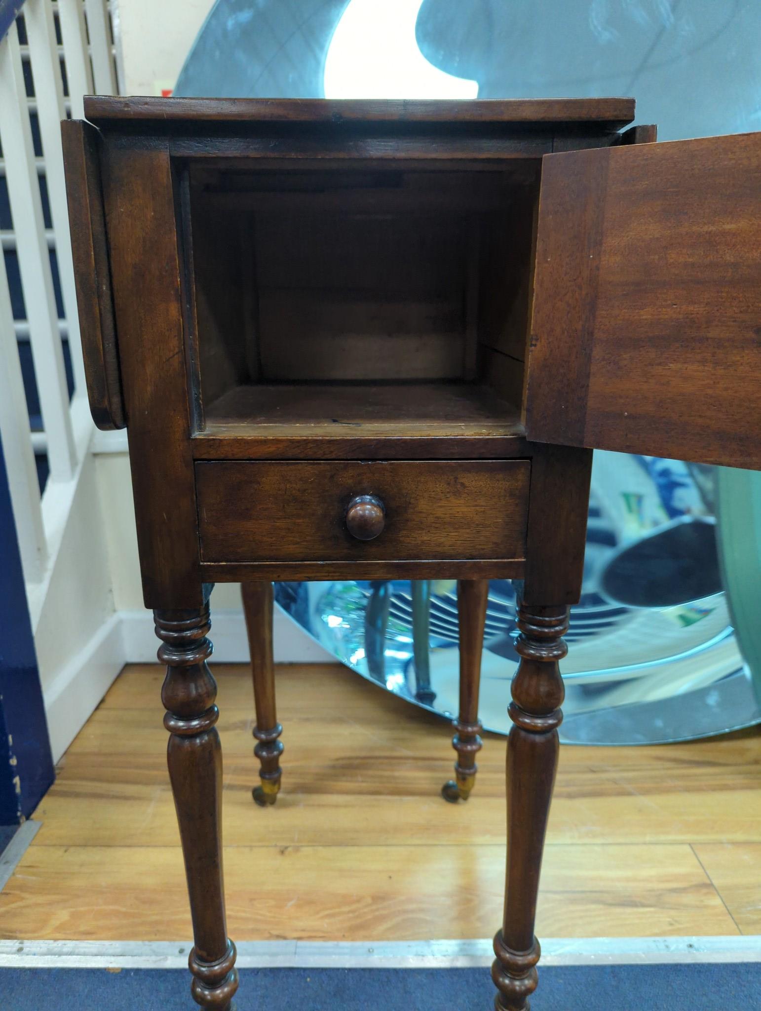 An early Victorian rosewood banded mahogany drop flap work table, width 34cm, depth 41cm, height 77cm